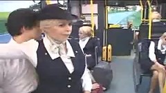 Busty German hostess giving handjob in the bus